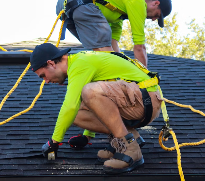roofer fixing a roof